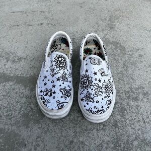 Vans White Slip-On Sneakers with Black Doodle Design